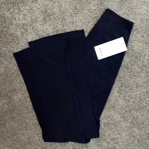 Lululemon never worn, Slit-Hem Flare *Nulu Leggings. Black, size 4